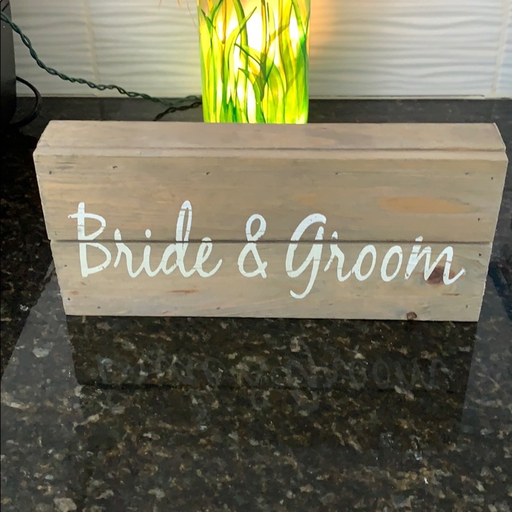 Bride and Groom sign